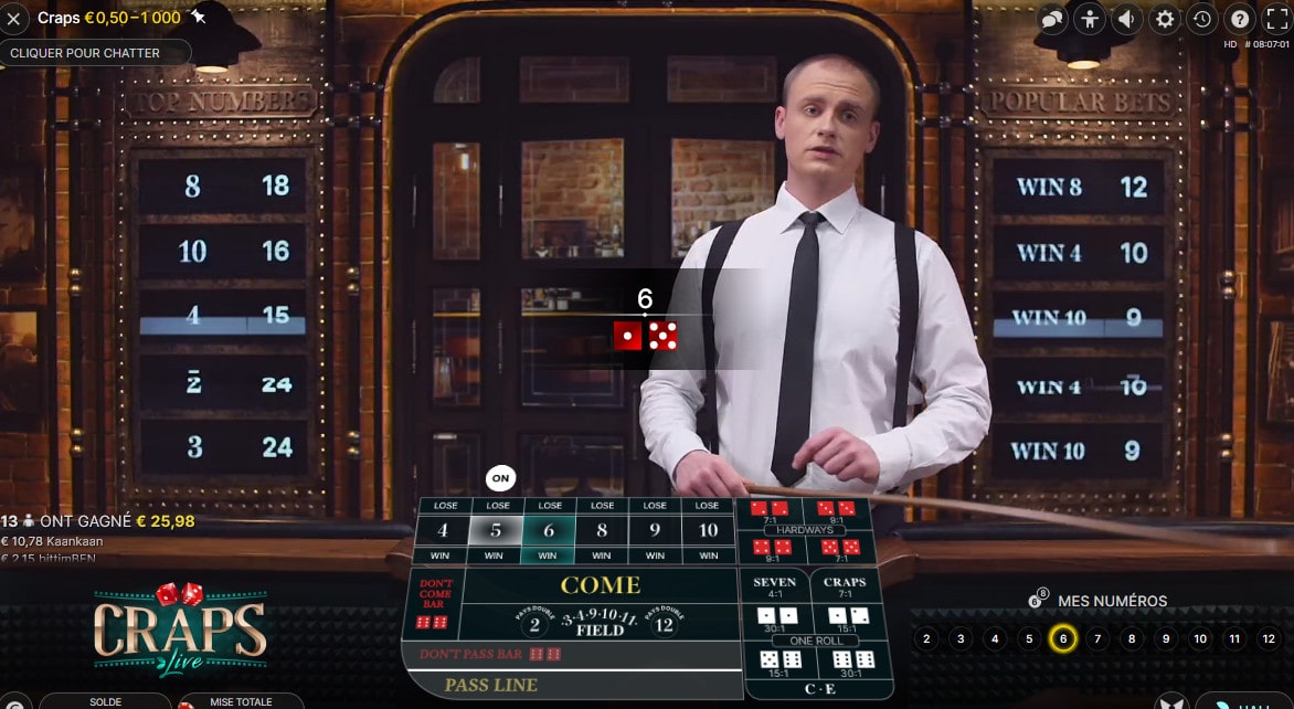 Le croupier annonce le résultat de Craps Live